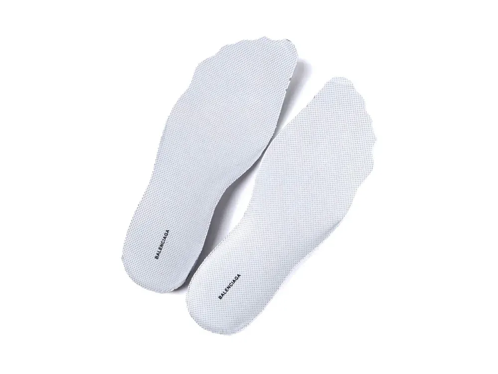 Grey fabric shoe insoles with branding, designed for comfort and support.