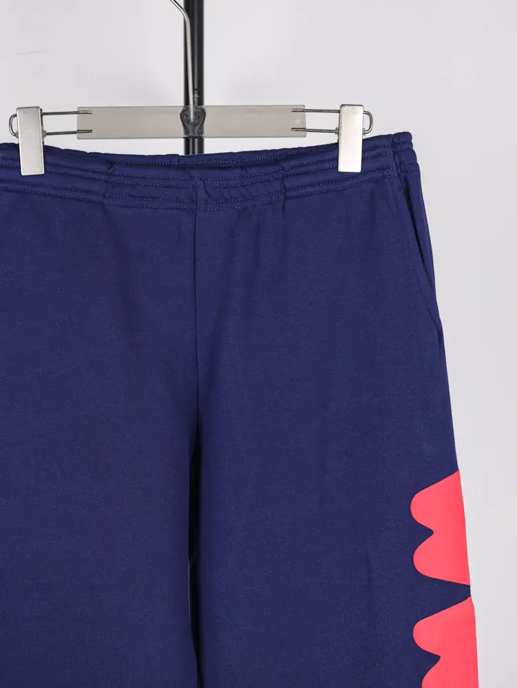 Displayed in the crotch area.