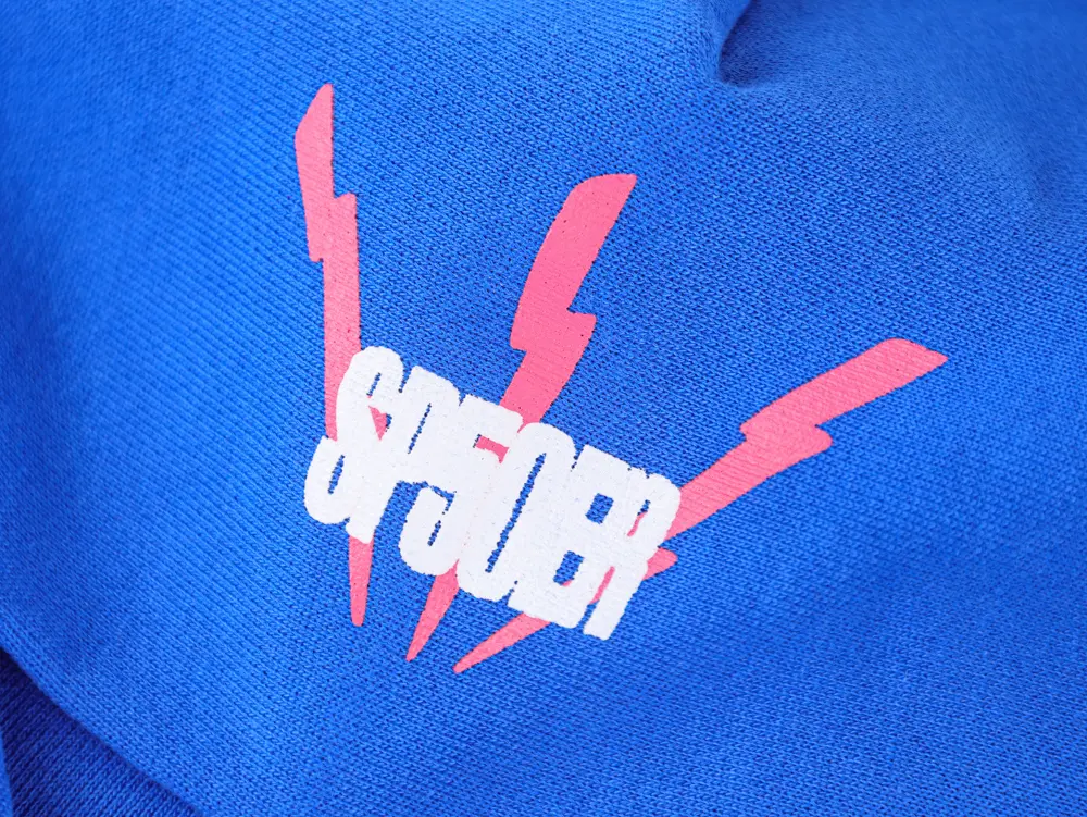 Blue fabric with red lightning bolt design and "SP5DER" text overlay.