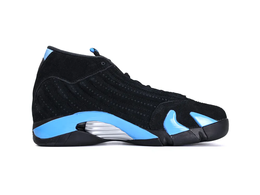 Black and blue suede sneaker with textured upper and detailed sole design.