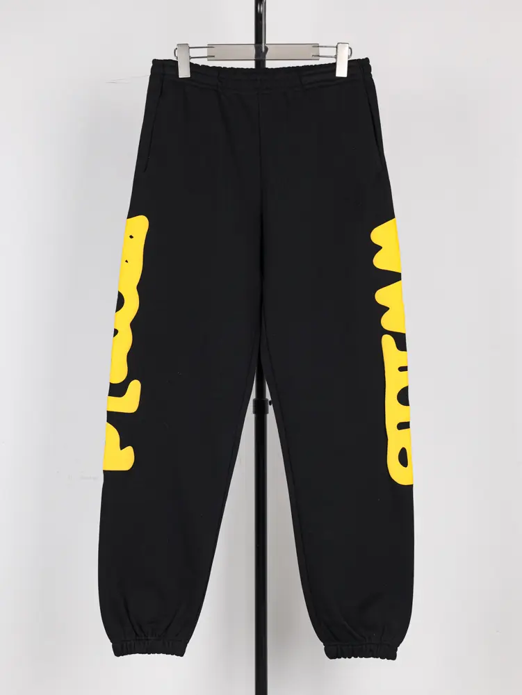 Sp5der Beluga Sweatpants in the Onyx/Yellow