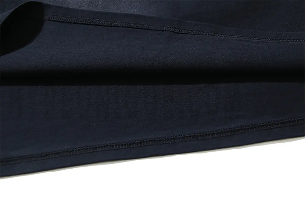 Precision cutting and sewing techniques in Shirt tail.