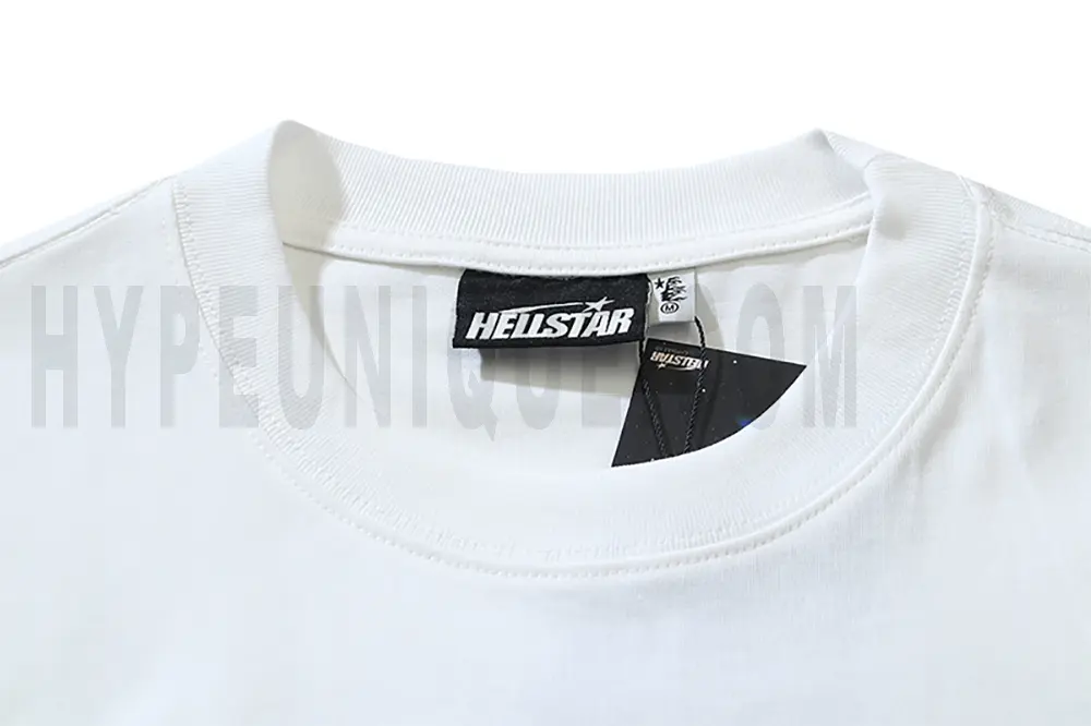 Close-up of the T-shirt's neckline tag, showcasing wash care instructions and brand details in a fashion design.