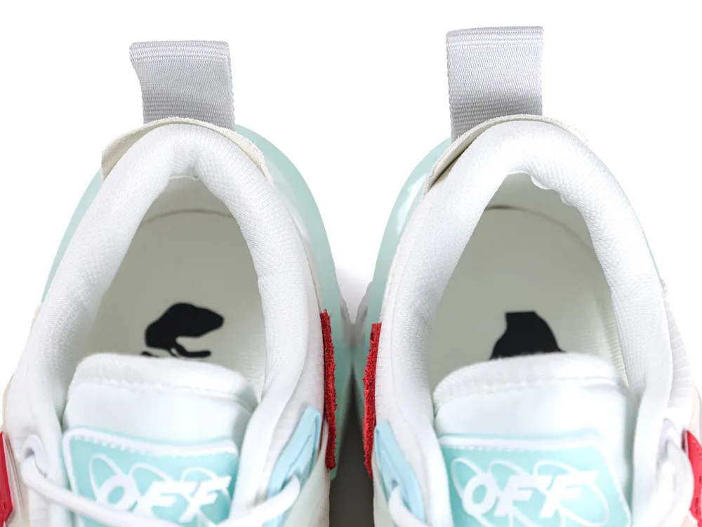 Interior view of sneakers showing Off-White branding and blue tongue labels