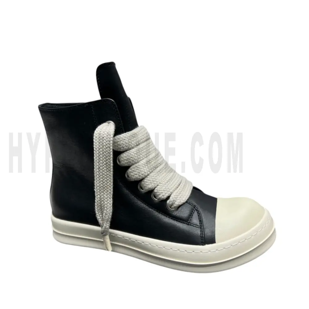 The right side of the black shoes