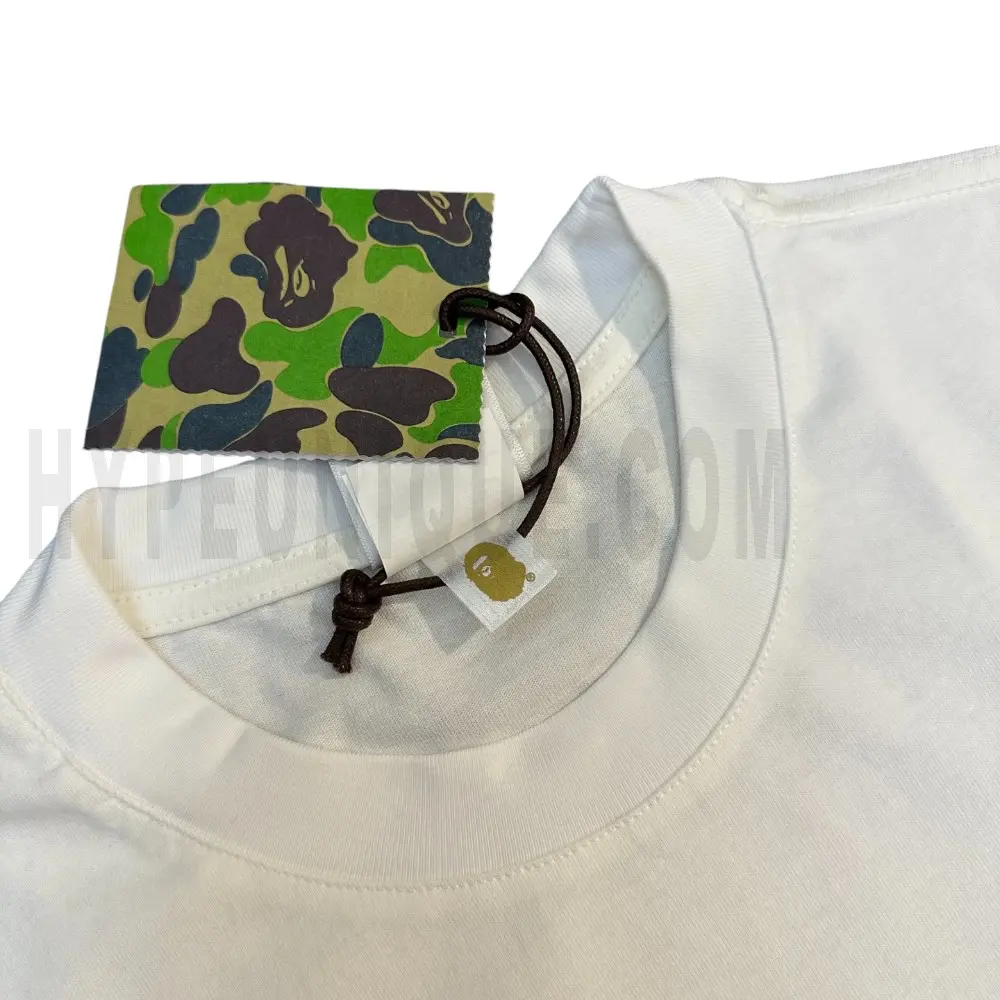 Neckline tag close-up, displaying garment care symbols and brand information with fashion-forward presentation.