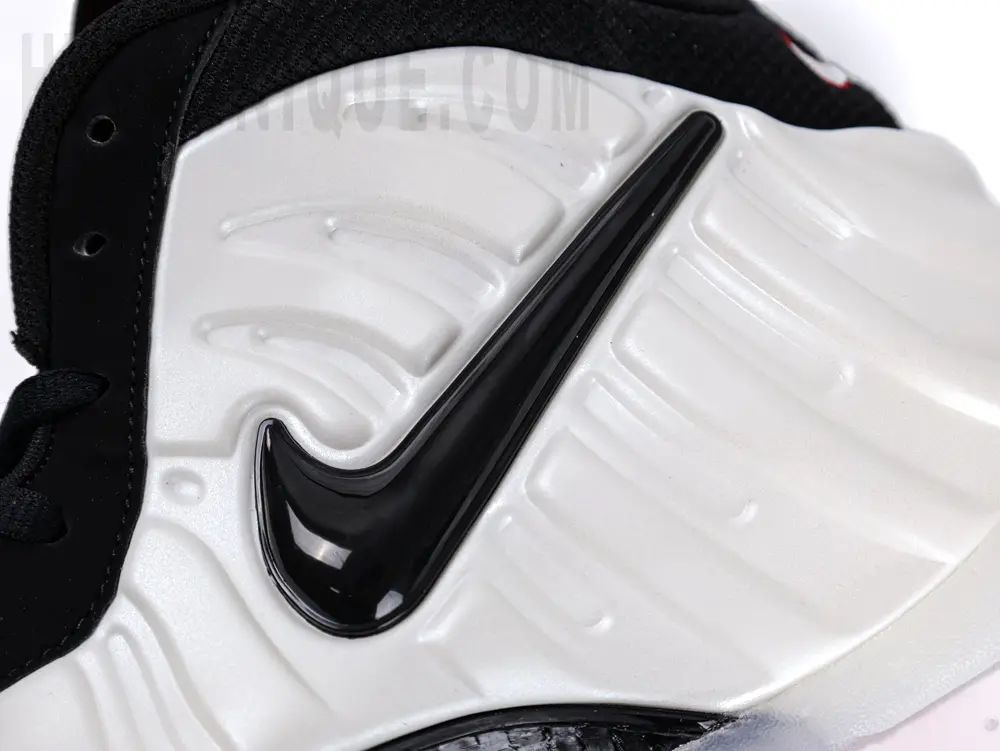 the black swoosh