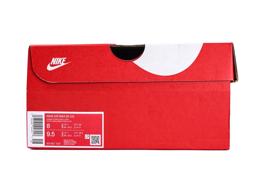 Red cardboard Nike shoe box with white branding and label details.