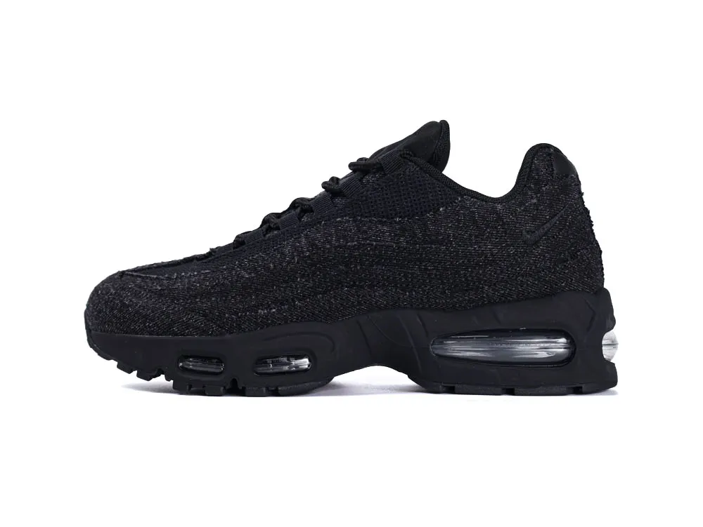 Black sneaker with a textured fabric upper and visible air cushioning sole.