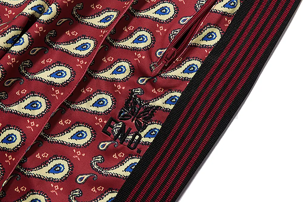 Exquisite butterfly embroidery and unique striped side panels.