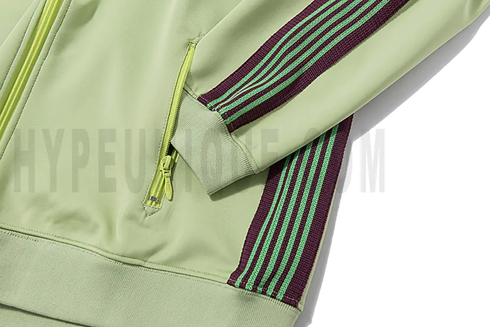 Close-up of sleeve stripe detail on the jacket.