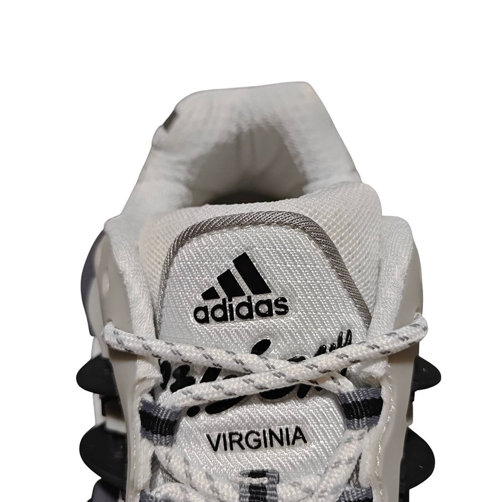 White and black Adidas running shoes