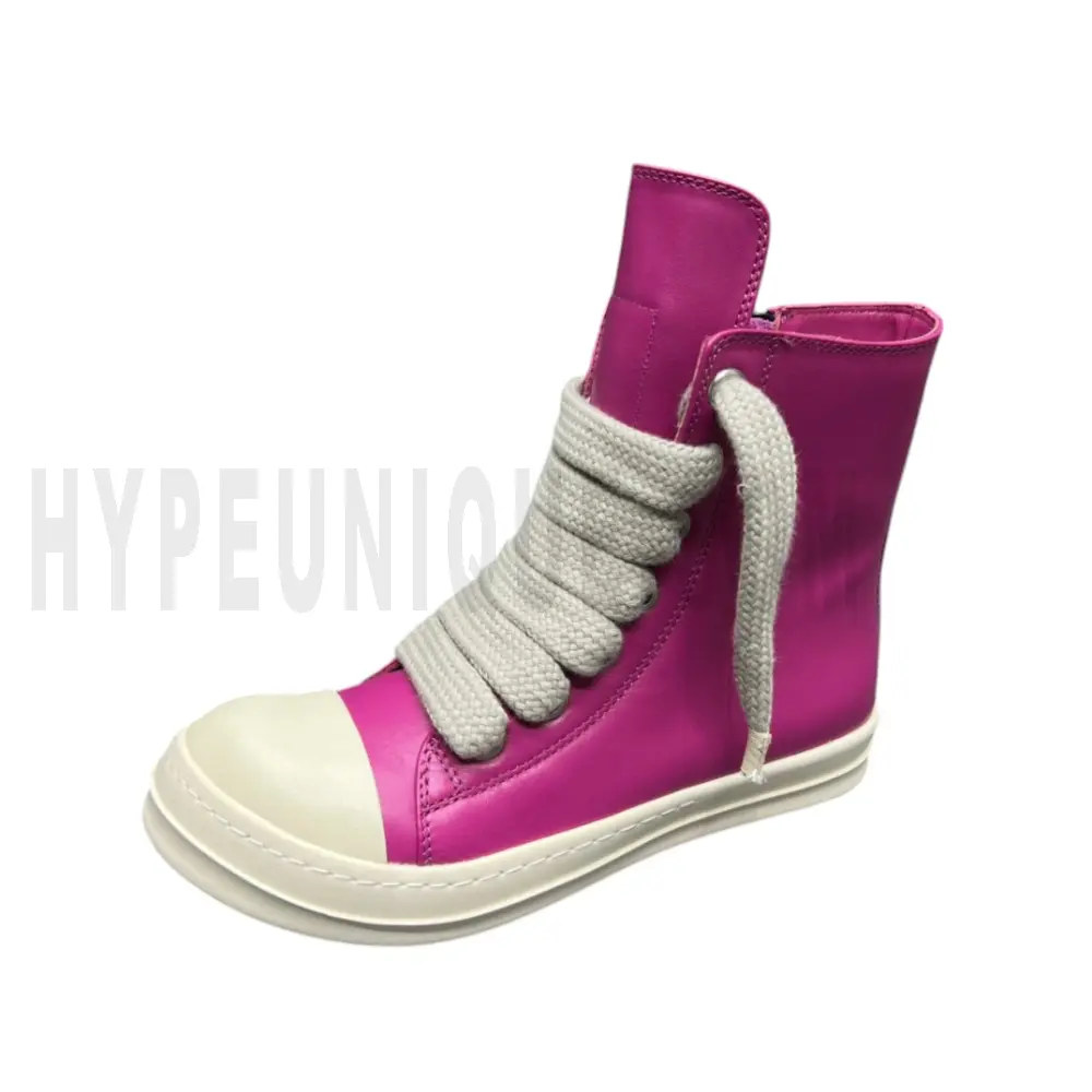 The left of the pink shoes