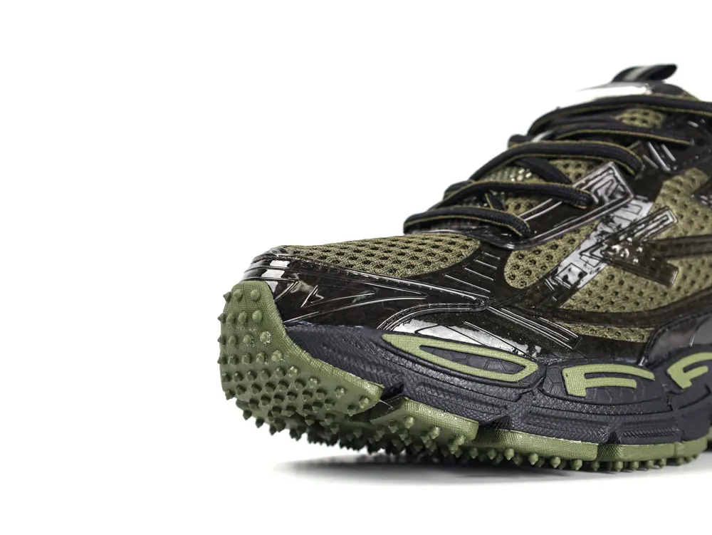 Close-up of front outsole and toe area of Off-White Black Be Right Back trainer with rugged traction