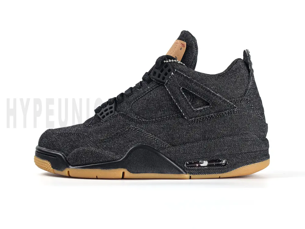 Detailed view of the heel on the Air Jordan 4 Retro Levi’s Black GS, highlighting the brown Levi’s patch on the black denim upper.