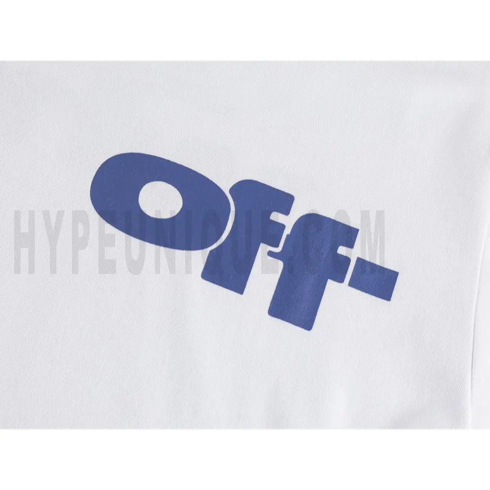 Detailed shot capturing the graphic print on the white tee's front panel.