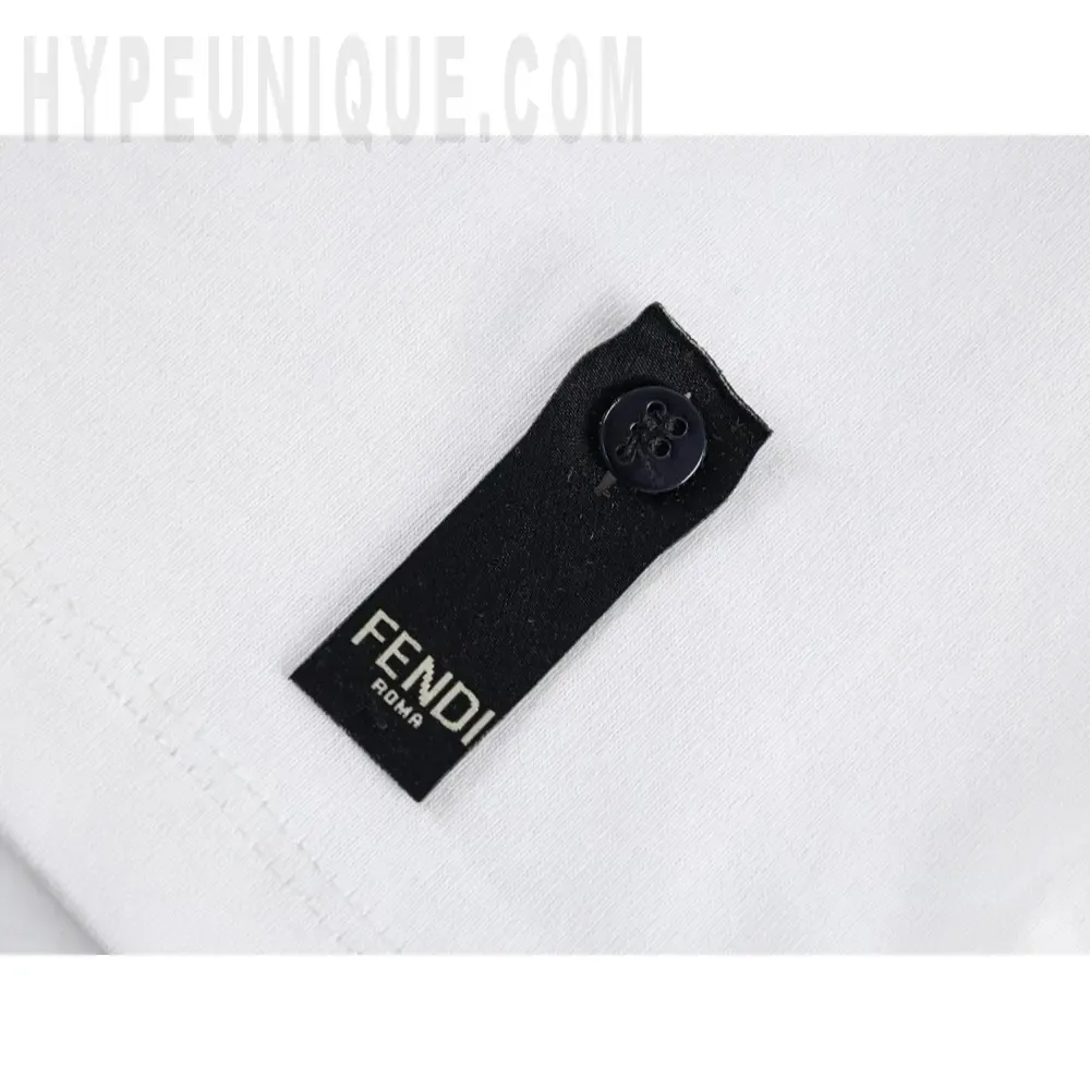 Close-up of button detail on the clothes