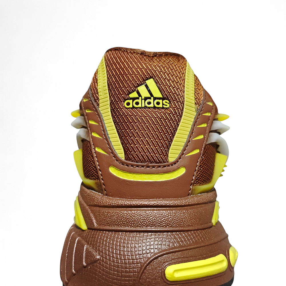 Gold logo, brown heel