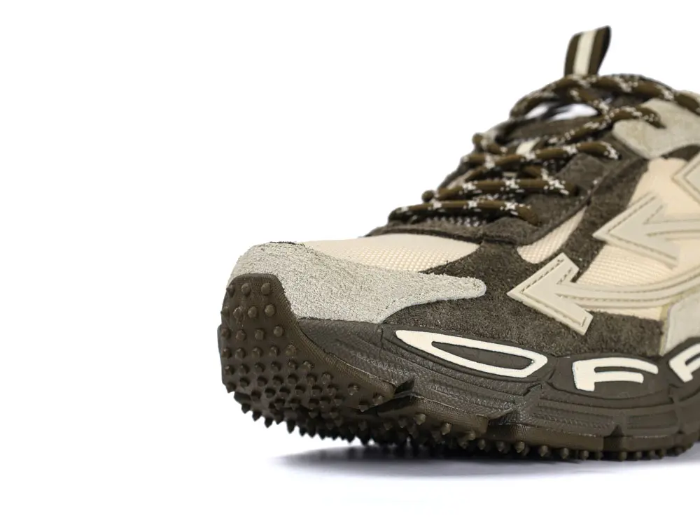 Off-White sneaker heel detail with suede overlay and pull tab