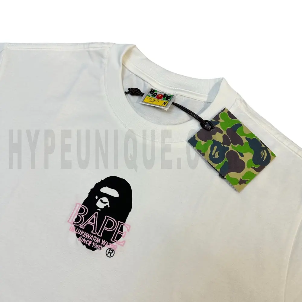 Close-up of the T-shirt print details of the front of the white clothes.