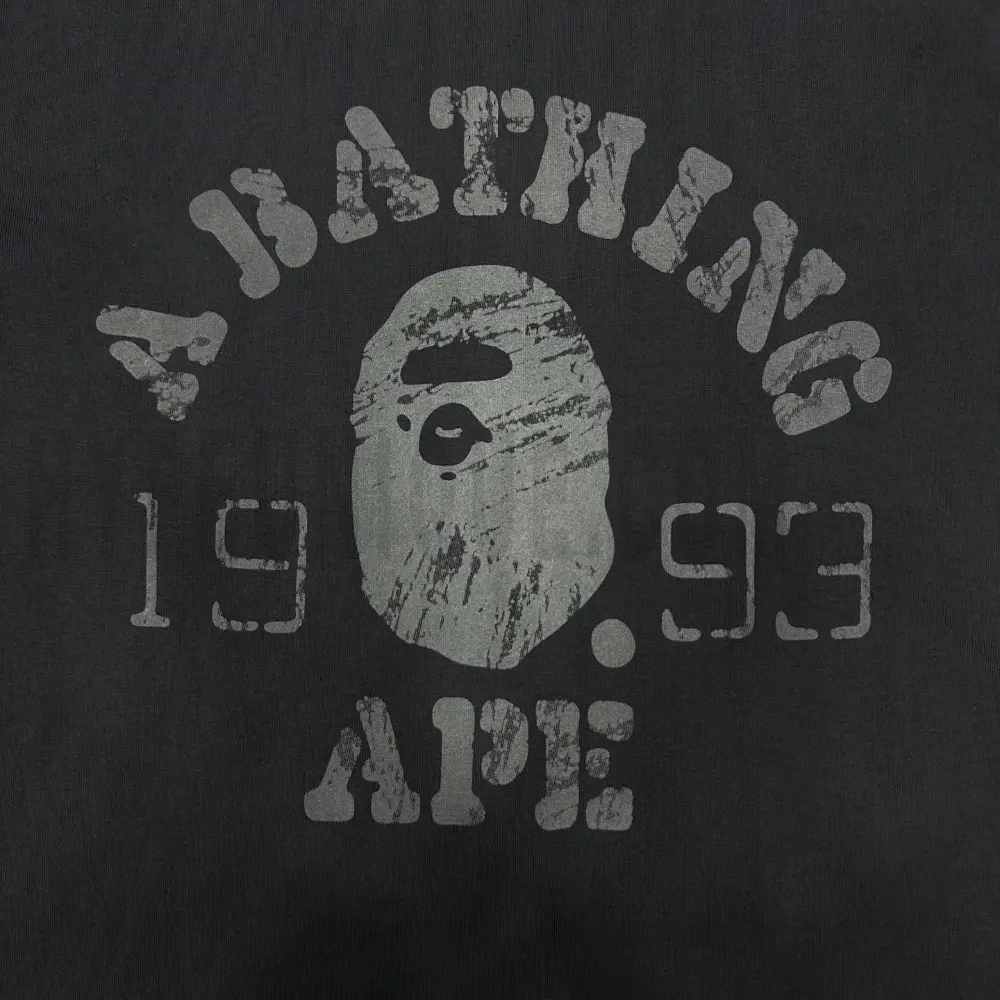 Close-up of the T-shirt print details of the front of the black clothes.