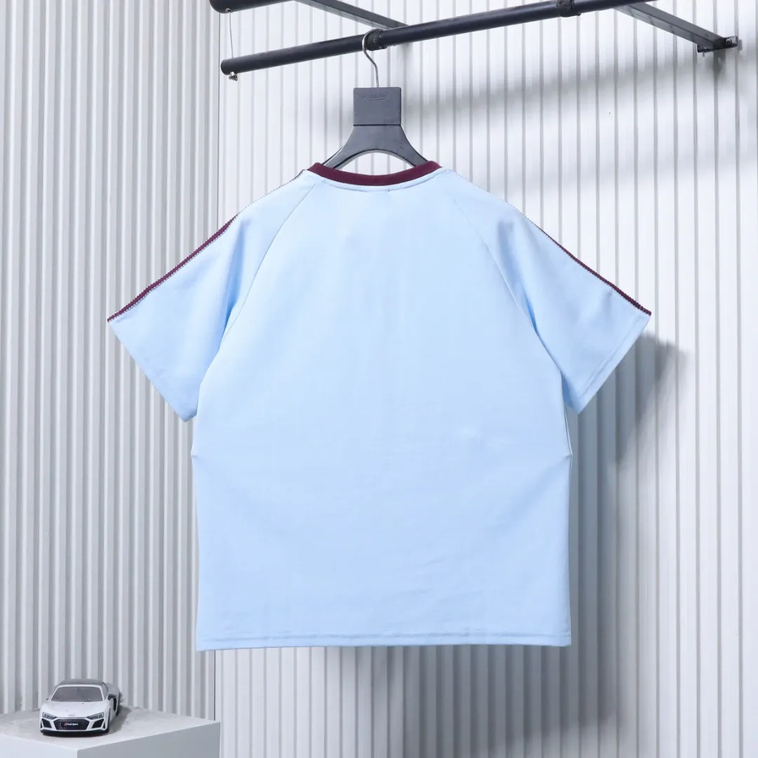 Back of Adidas BRITCORE RINGER Retro Three Stripes T-Shirt Color Blue